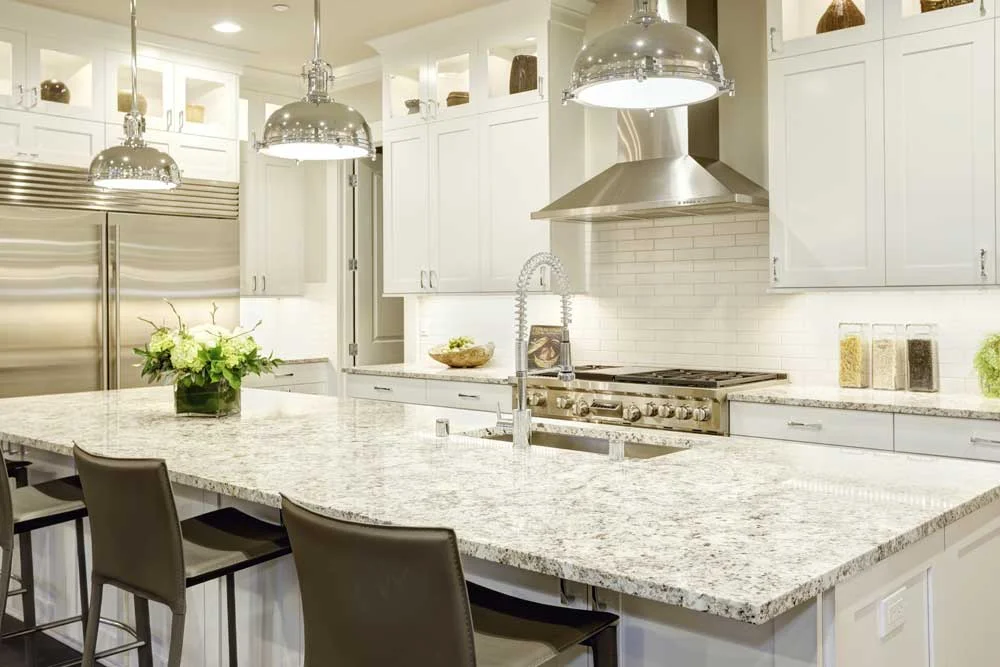 Custom White Ice granite kitchen island and perimeter countertops with eased edge installed in Provo, Utah